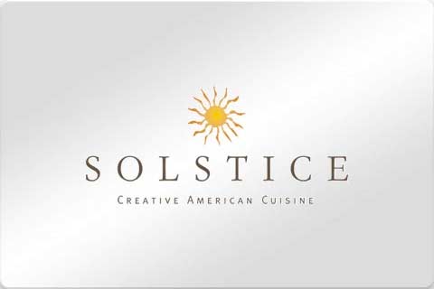 A Solstice gift card with logo on a shiny silver card